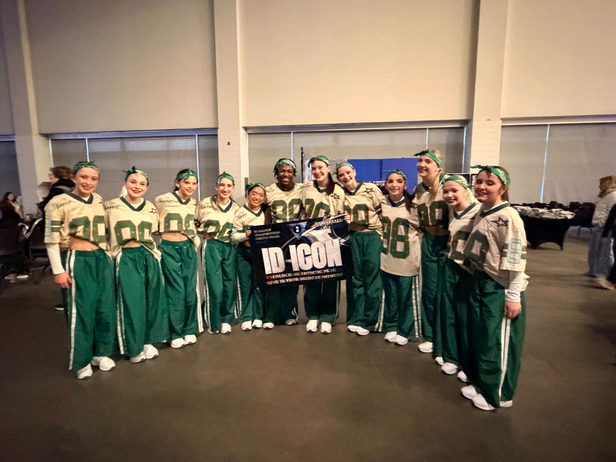 Dance Place performance team posing together at competition